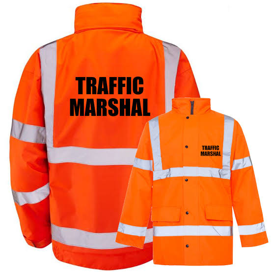 Traffic marshal directing traffic in London